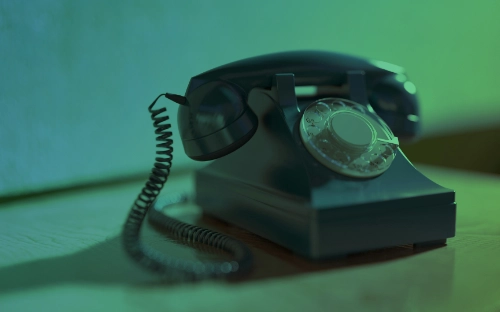 
                      An old-fashioned rotary telephone, representing out of date telephony equipment.
                    