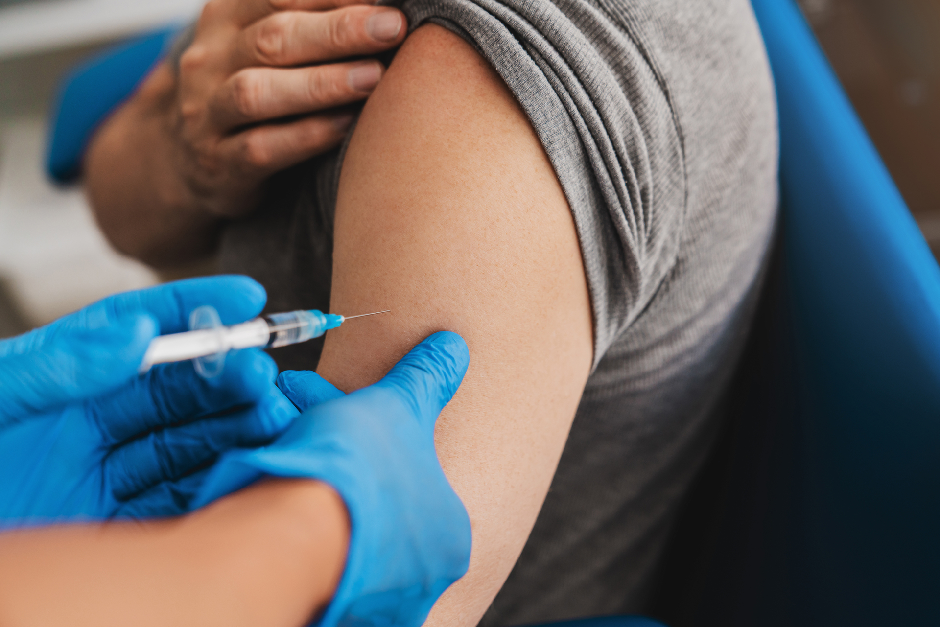 a flu jab being administered